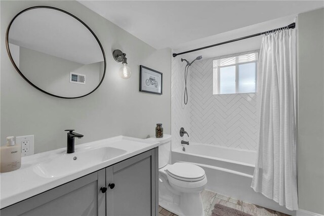 605 W 59th Ter, Kansas City, MO 64113 - full bath with shower / bathtub combination with curtain and vanity