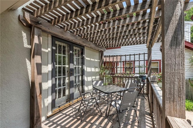 605 W 59th Ter, Kansas City, MO 64113 - wooden terrace with french doors, a pergola, and outdoor dining space