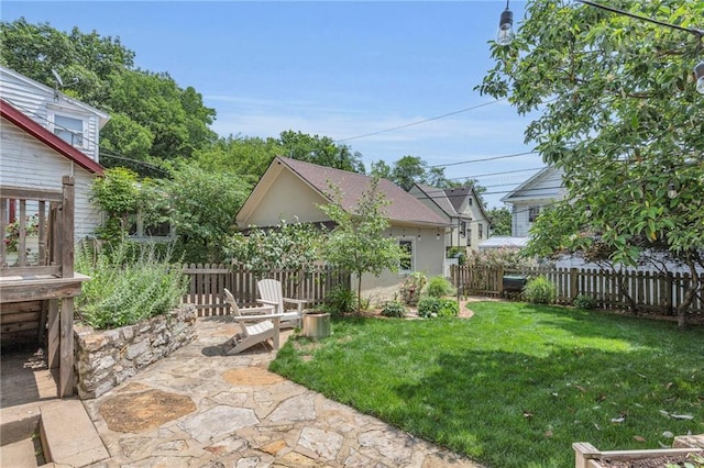 605 W 59th Ter, Kansas City, MO 64113 - view of yard with a patio