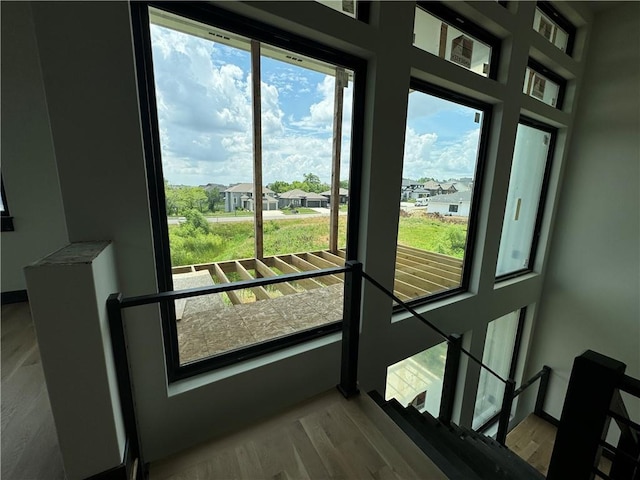 22659 W 87th St, Lenexa, KS 66227 - entryway featuring plenty of natural light and wood finished floors