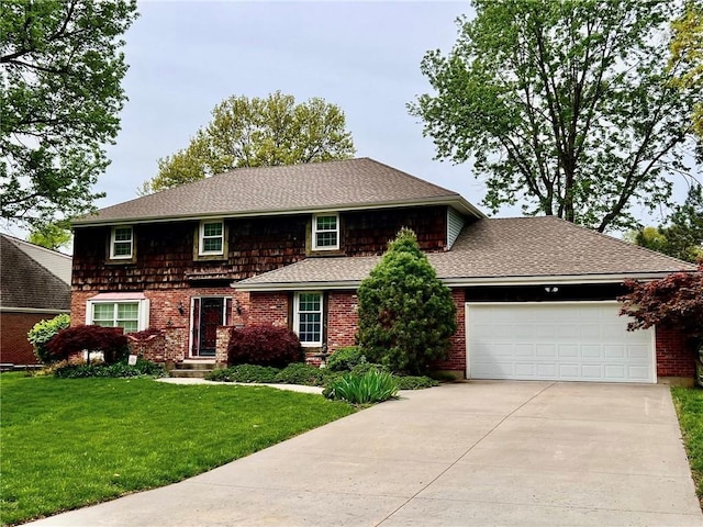 4336 S Dover Ave, Independence, MO 64055 - view of front of home with an attached garage, driveway, a front yard, and a shingled roof