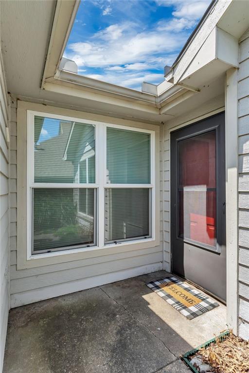 entrance to property with a patio area