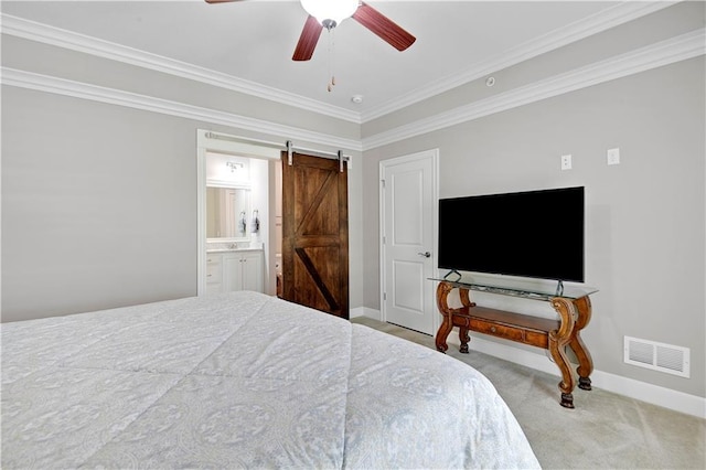 15908 Fontana St Unit 240, Overland Park, KS 66085 - bedroom with a barn door, baseboards, carpet flooring, ornamental molding, and a ceiling fan