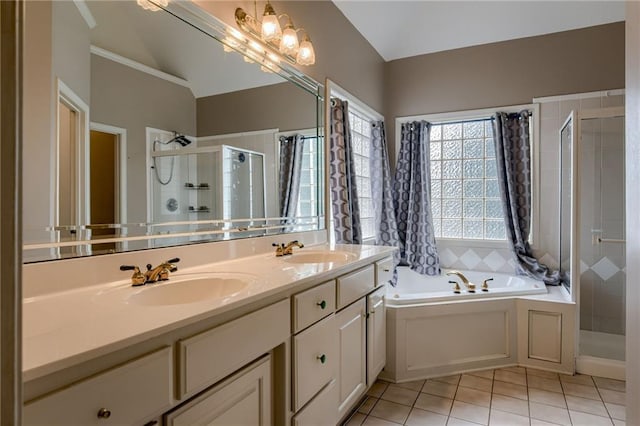 7100 N Cherry St, Gladstone, MO 64118 - bathroom with a shower stall, tile patterned floors, double vanity, a bath, and lofted ceiling