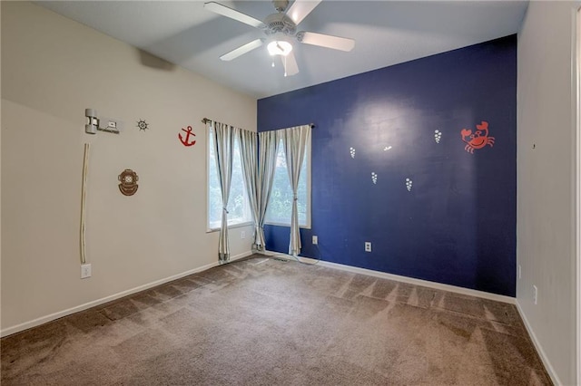 7100 N Cherry St, Gladstone, MO 64118 - empty room with ceiling fan, carpet, and baseboards