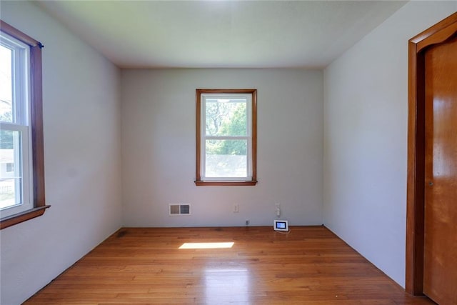3001 S Hardy Ave, Independence, MO 64052 - spare room featuring light wood-style flooring