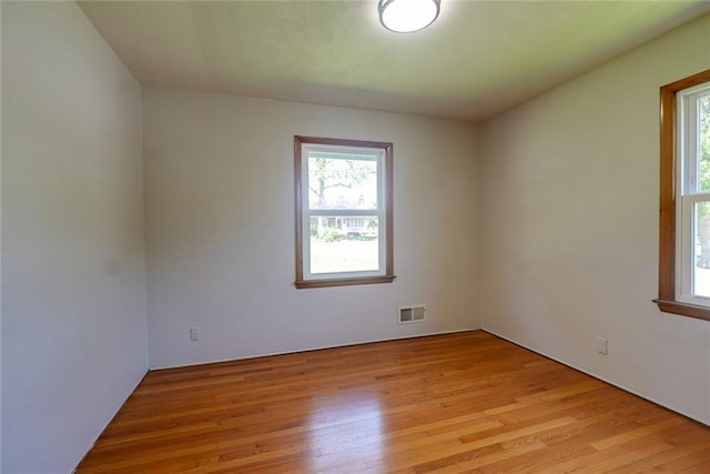3001 S Hardy Ave, Independence, MO 64052 - spare room featuring light wood-style floors