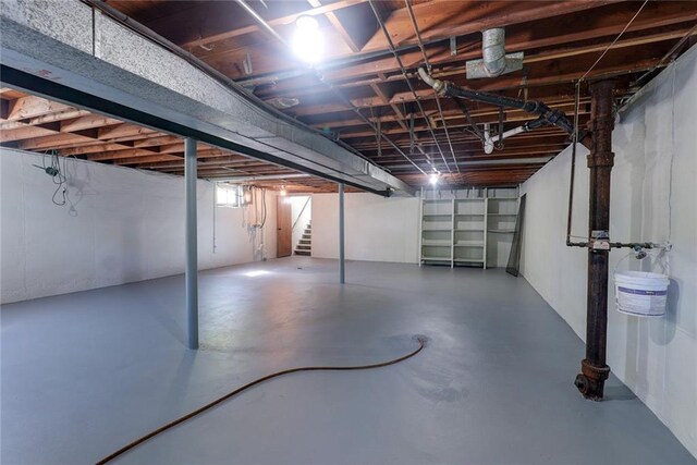 3001 S Hardy Ave, Independence, MO 64052 - below grade area featuring stairs
