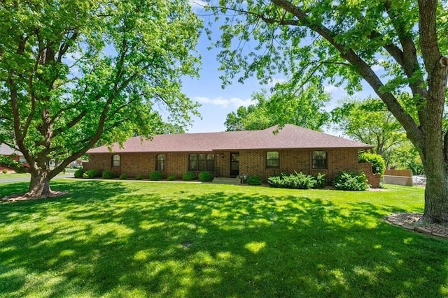 2107 N 154th Ter, Basehor, KS 66007 - ranch-style house featuring a front lawn and brick siding