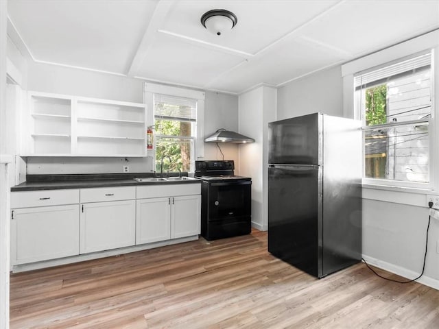 kitchen featuring black appliances, a sink, open shelves, dark countertops, and under cabinet range hood