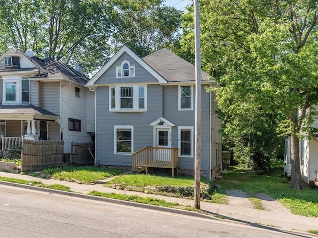 view of front of home with fence
