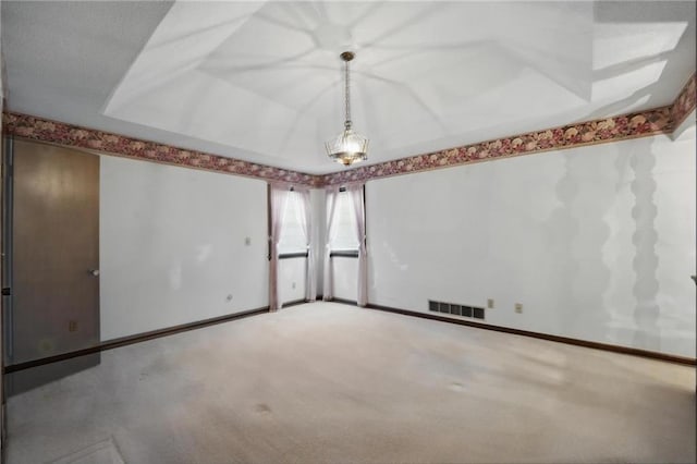 empty room with carpet floors and baseboards