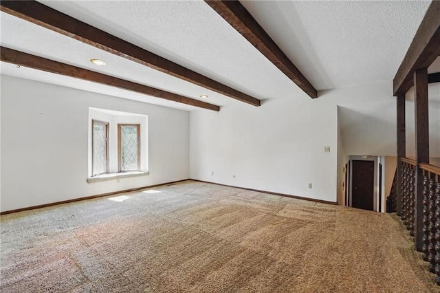 unfurnished living room featuring carpet floors, baseboards, beam ceiling, a textured ceiling, and recessed lighting