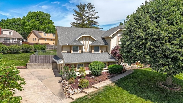 view of front of property featuring concrete driveway and stucco siding