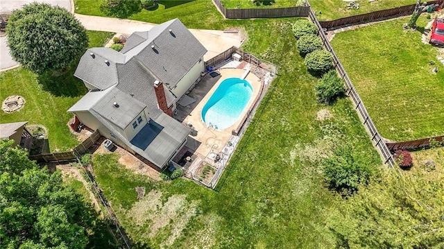 view from above of property featuring a pool area