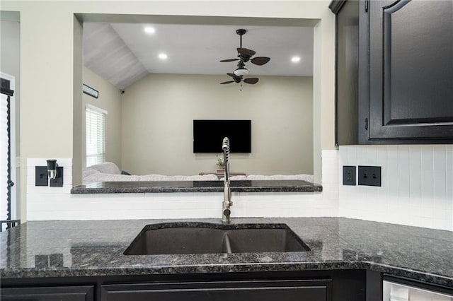 222 Prairie Ln, Wellsville, KS 66092 - kitchen with a sink, ceiling fan, backsplash, dark stone counters, and recessed lighting