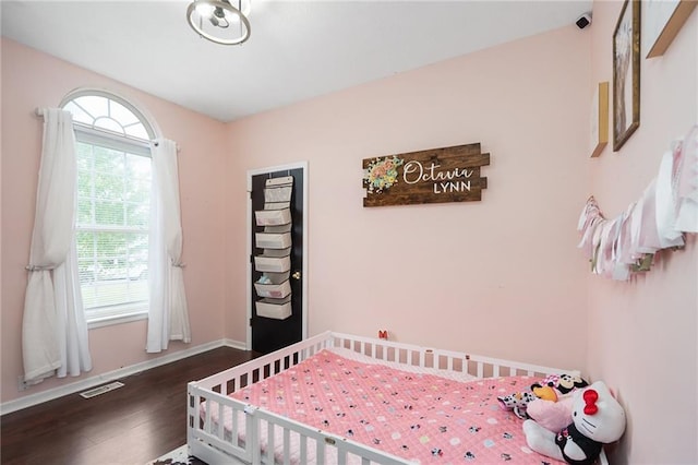 222 Prairie Ln, Wellsville, KS 66092 - bedroom featuring wood finished floors and baseboards