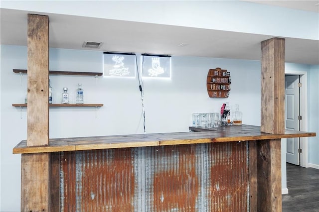 222 Prairie Ln, Wellsville, KS 66092 - detailed view of a dry bar, wood finished floors, and baseboards