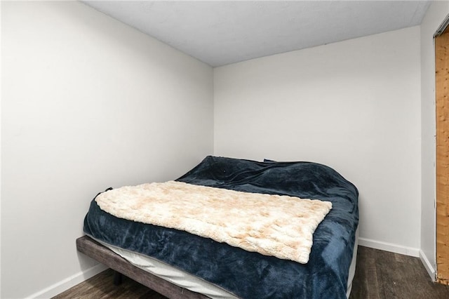 222 Prairie Ln, Wellsville, KS 66092 - bedroom with baseboards and wood finished floors