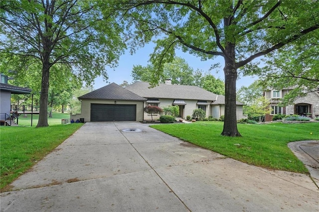 11203 Cedar St, Leawood, KS 66211 - view of front of home with a garage, concrete driveway, a front lawn, and a chimney
