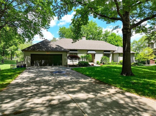 11203 Cedar St, Leawood, KS 66211 - ranch-style home featuring driveway, a garage, a front lawn, and a chimney