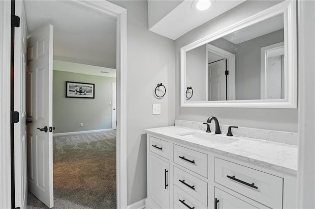 11203 Cedar St, Leawood, KS 66211 - bathroom featuring vanity and baseboards