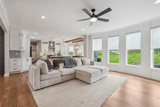 4813 NE Jamestown Dr, Lees Summit, MO 64064 - living area with ceiling fan, recessed lighting, and wood finished floors