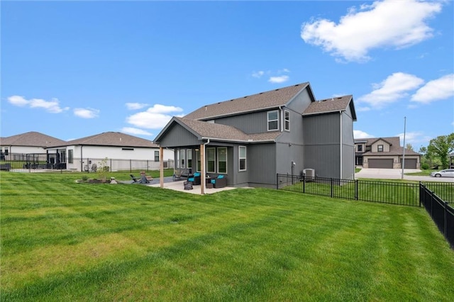 4813 NE Jamestown Dr, Lees Summit, MO 64064 - rear view of house with a patio, a fenced backyard, an outdoor hangout area, and a shingled roof