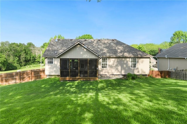 1200 SW Creekside Dr, Lees Summit, MO 64081 - rear view of house featuring a sunroom and a shingled roof