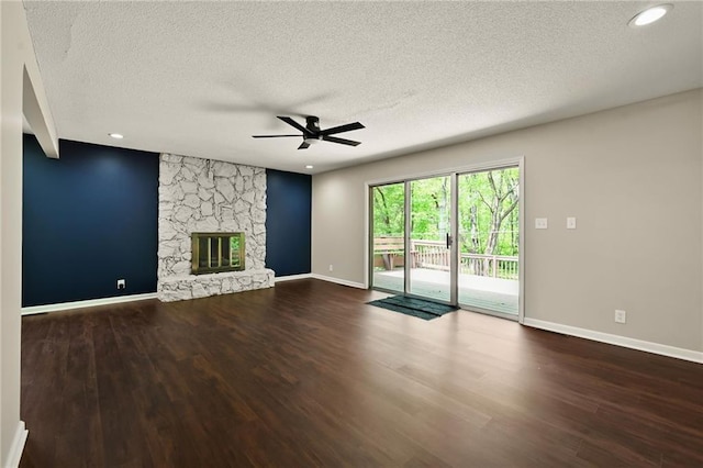 7826 Haskell Dr, Kansas City, KS 66109 - unfurnished living room with ceiling fan, a textured ceiling, wood finished floors, baseboards, and recessed lighting