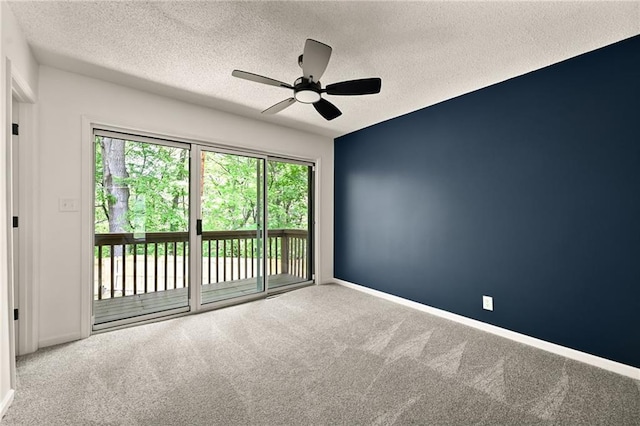 7826 Haskell Dr, Kansas City, KS 66109 - empty room with carpet floors, ceiling fan, a textured ceiling, and baseboards