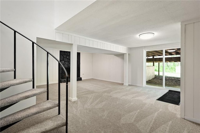 7826 Haskell Dr, Kansas City, KS 66109 - stairway featuring carpet flooring and a textured ceiling