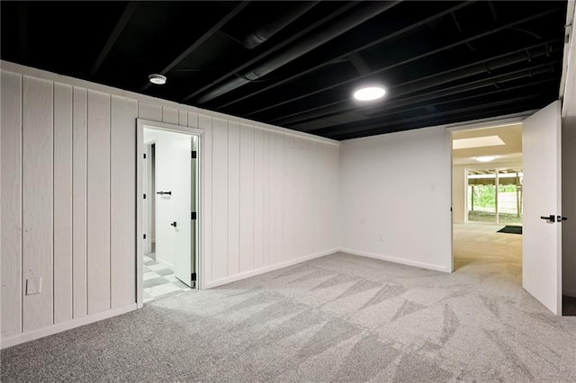 7826 Haskell Dr, Kansas City, KS 66109 - below grade area featuring carpet floors and baseboards