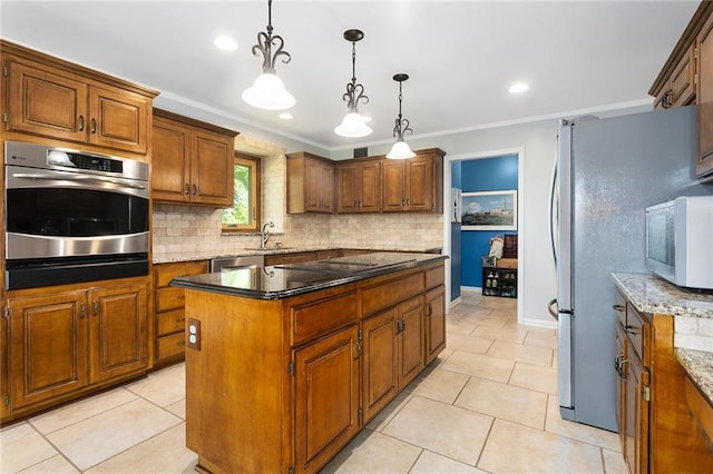 17699 157th Ter, Basehor, KS 66007 - kitchen with stainless steel appliances, backsplash, a kitchen island, a sink, and a warming drawer