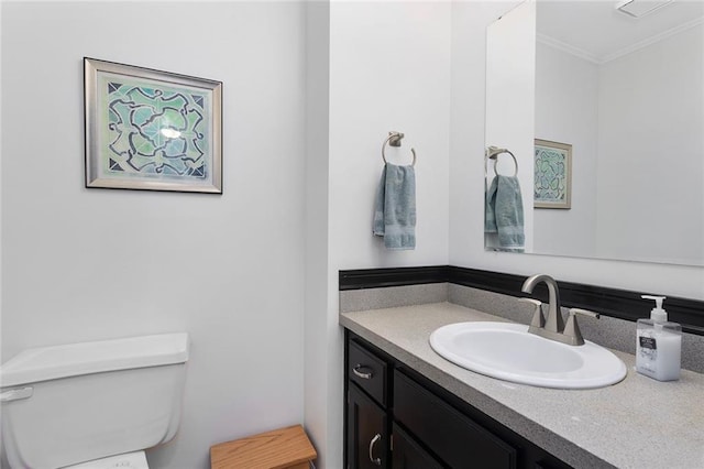 17699 157th Ter, Basehor, KS 66007 - bathroom featuring ornamental molding, toilet, and vanity