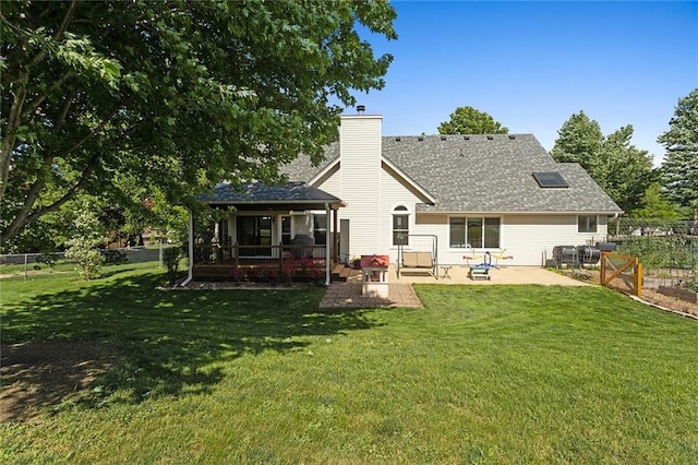 17699 157th Ter, Basehor, KS 66007 - rear view of property with a patio, a chimney, and a shingled roof