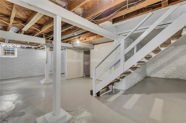 unfinished basement with stairs
