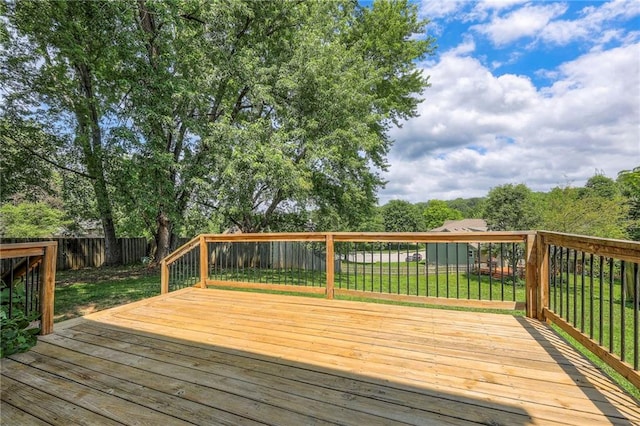 4729 Halsey St, Shawnee, KS 66216 - wooden terrace featuring a fenced backyard