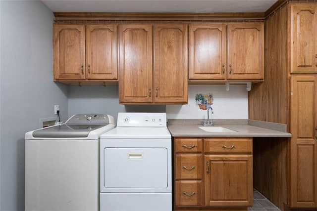 laundry room with cabinet space and washer and dryer