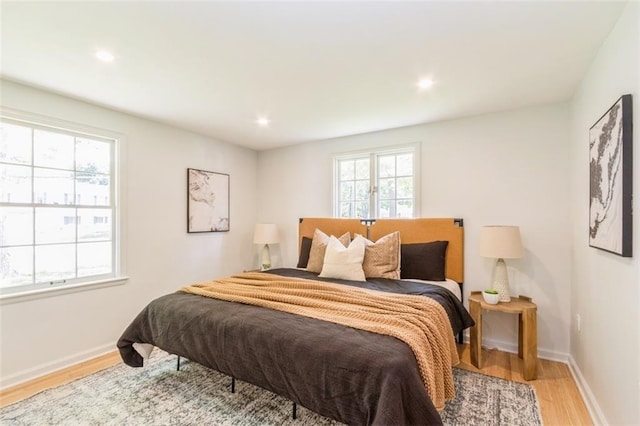 5008 W 79th St, Prairie Village, KS 66208 - bedroom with light wood finished floors, baseboards, and recessed lighting