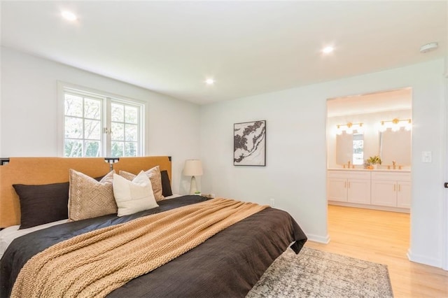 5008 W 79th St, Prairie Village, KS 66208 - bedroom with light wood-style flooring, ensuite bath, and recessed lighting