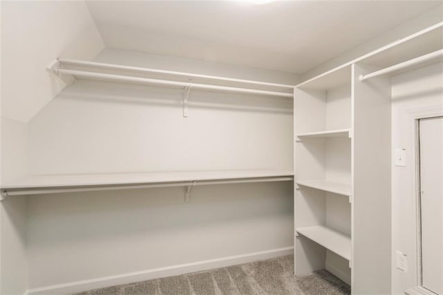 5008 W 79th St, Prairie Village, KS 66208 - walk in closet featuring carpet flooring