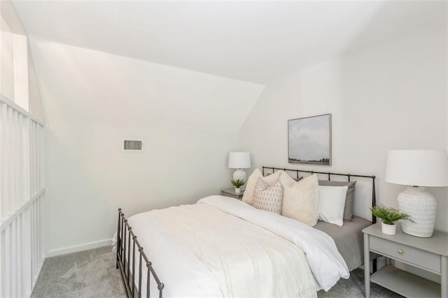 5008 W 79th St, Prairie Village, KS 66208 - carpeted bedroom featuring vaulted ceiling and baseboards