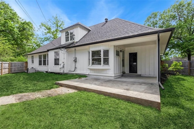 5008 W 79th St, Prairie Village, KS 66208 - back of house featuring roof with shingles and board and batten siding