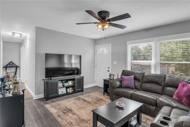 835 N 83rd Dr, Kansas City, KS 66112 - living room with a ceiling fan, dark wood-type flooring, and baseboards