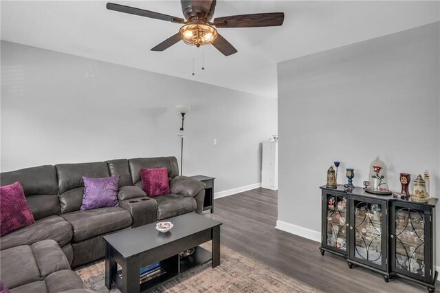 835 N 83rd Dr, Kansas City, KS 66112 - living room with a ceiling fan, wood finished floors, and baseboards
