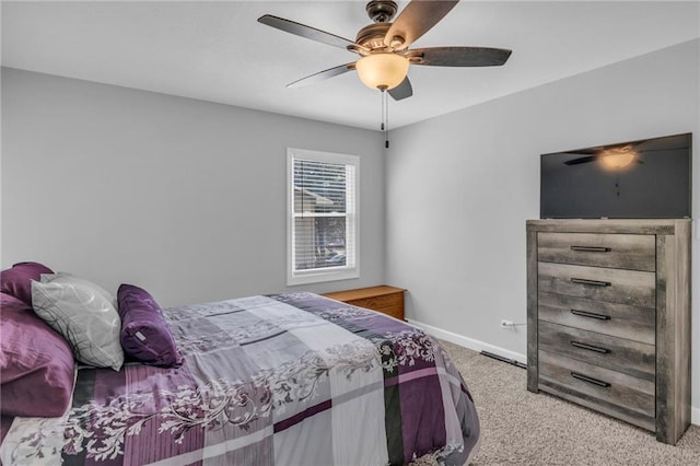 835 N 83rd Dr, Kansas City, KS 66112 - carpeted bedroom with baseboards and a ceiling fan