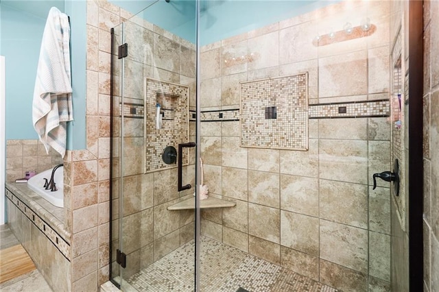16805 266th Rd, Atchison, KS 66002 - bathroom featuring a bath and a shower stall