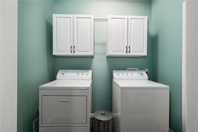 16805 266th Rd, Atchison, KS 66002 - laundry area featuring cabinet space and washer and clothes dryer