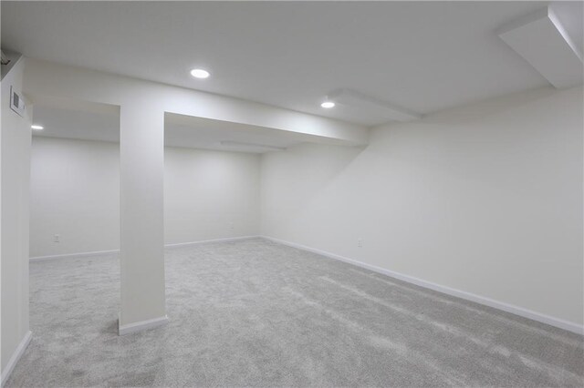15608 E 267th St, Harrisonville, MO 64701 - finished below grade area featuring carpet flooring, recessed lighting, and baseboards